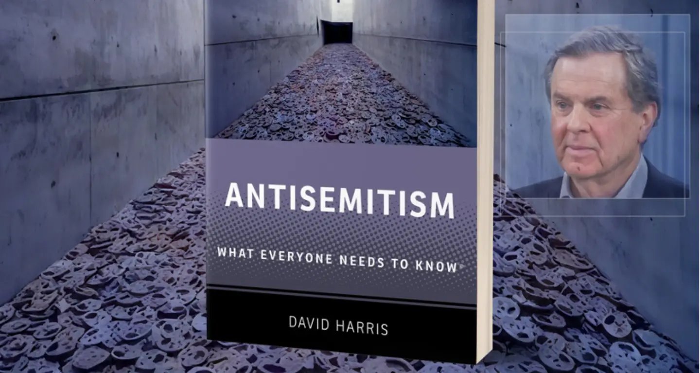Cover of "Antisemitism: What Everyone Needs to Know" by David Harris, with a man’s face in the background.