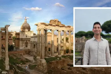 A man in a light shirt is in a photo superimposed over Roman ruins.