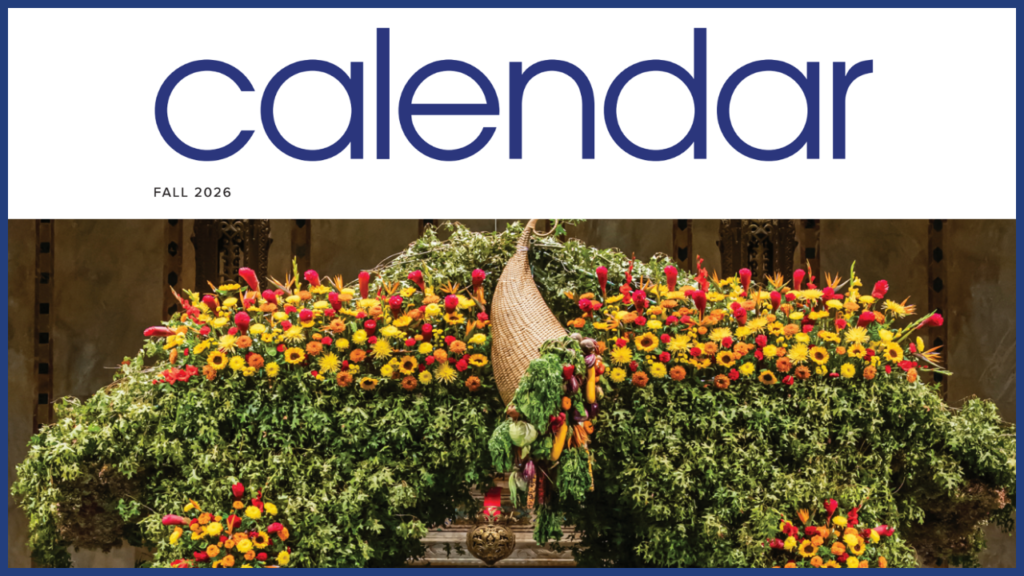 Large arrangement of colorful flowers and greenery in a decorative display beneath calendar text for Fall 2026, celebrating the season at Temple Emanu-El, a Reform Jewish synagogue in New York City.