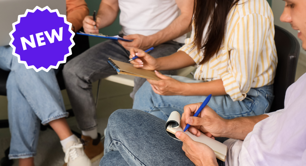 Four members of the Temple Emanu-El community collaborate together, each writing on clipboards in a group setting, with a purple NEW label in the corner.