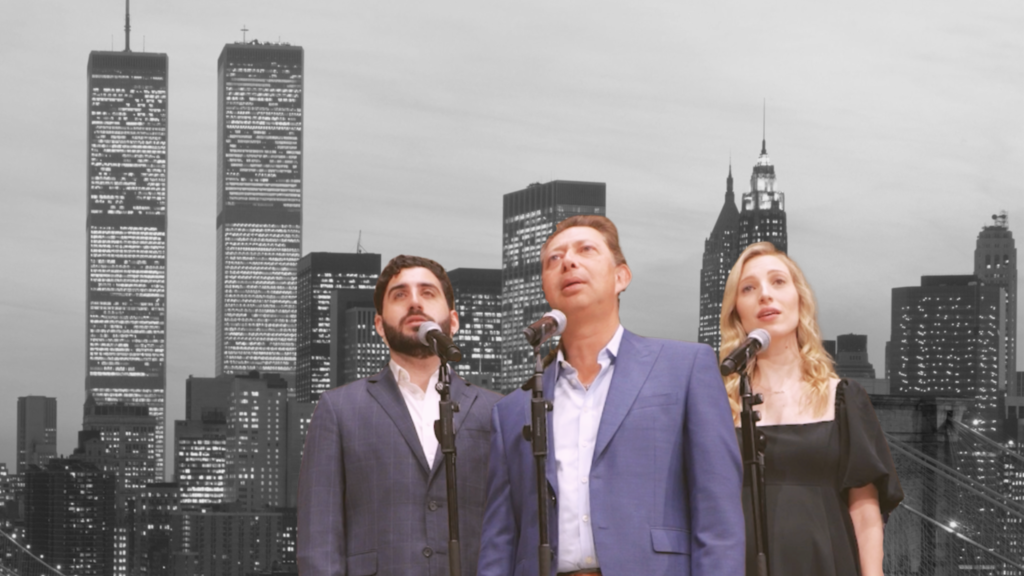 Three people in formal attire sing into microphones with a grayscale city skyline behind them, capturing the sense of tradition, unity, and vibrant community found at Temple Emanu-El in New York City.