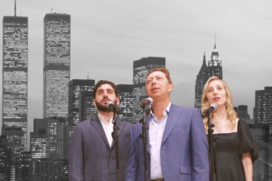 Three people in formal attire sing into microphones with a grayscale city skyline behind them, capturing the sense of tradition, unity, and vibrant community found at Temple Emanu-El in New York City.